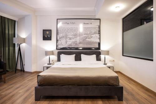 Giường trong phòng chung tại Citadel Narikala Hotel