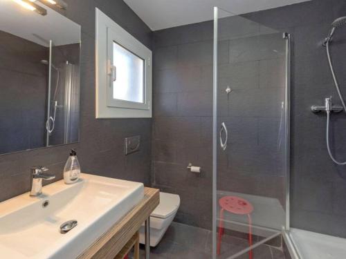 a bathroom with a shower and a sink and a toilet at Stay Barcelona - Castelldefels in Castelldefels