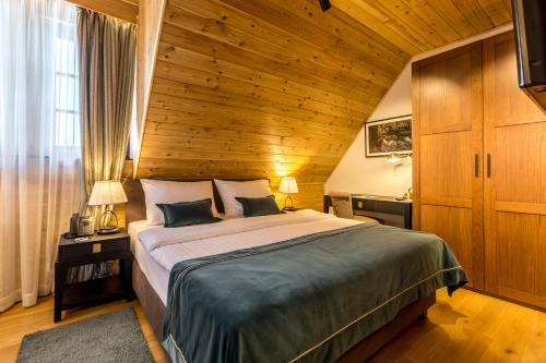 Posteľ alebo postele v izbe v ubytovaní Fenomen Plitvice Resort