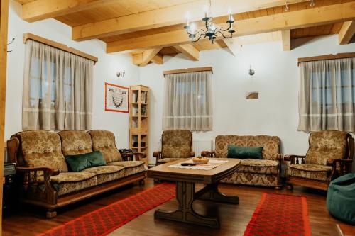 Posezení v ubytování DEMETER Guesthouse FOX Siclod