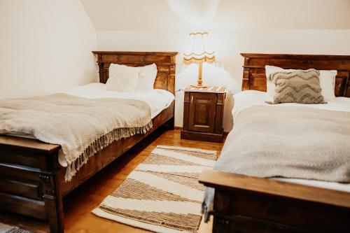 Postel nebo postele na pokoji v ubytování DEMETER Guesthouse FOX Siclod