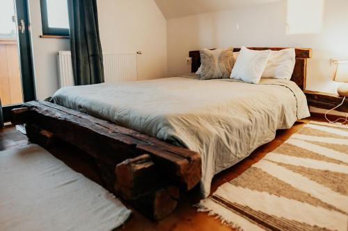 Postel nebo postele na pokoji v ubytování DEMETER Guesthouse FOX Siclod