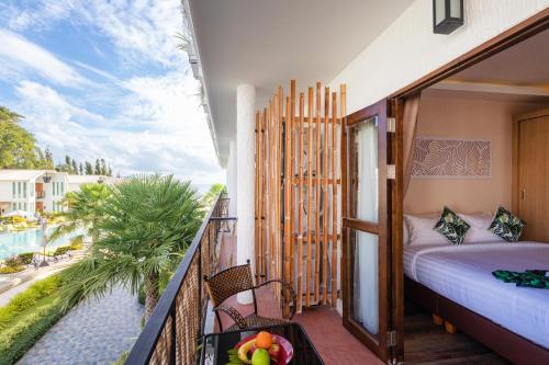 Balkón nebo terasa v ubytování Vannee Golden Sands Beachfront Resort
