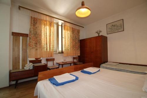 Ένα ή περισσότερα κρεβάτια σε δωμάτιο στο Boho Rooms & Apartments