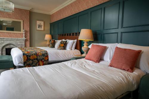 Katil atau katil-katil dalam bilik di The Royal Inn by Chef & Brewer Collection