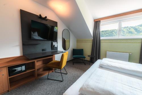 Televisyen dan/atau pusat hiburan di Landhotel Prielbauer