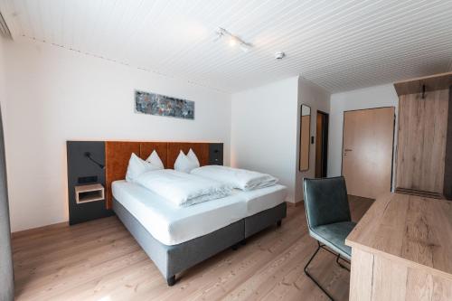Katil atau katil-katil dalam bilik di Landhotel Prielbauer