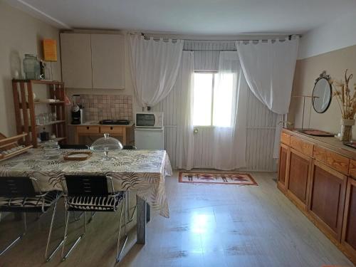 Kuchyň nebo kuchyňský kout v ubytování Home Meditamondo