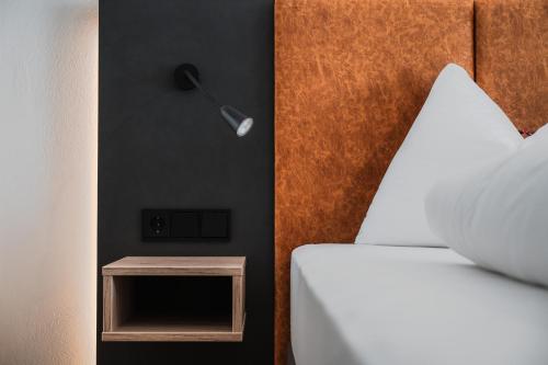 Katil atau katil-katil dalam bilik di Landhotel Prielbauer