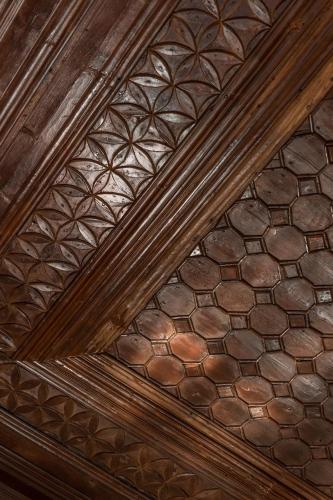 an overhead view of a wooden ceiling with patterns at FOS Hydra residence in Hydra