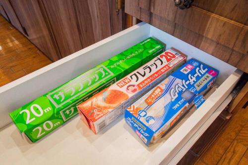 a refrigerator filled with different types of snacks at THE BLAUBAUM TOYA in Lake Toya