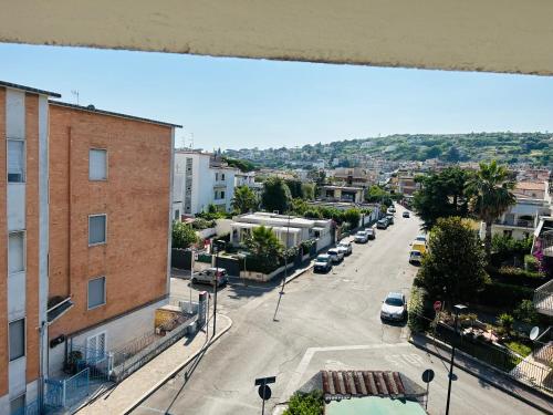 an aerial view of a city street with cars parked at Luisella in Gaeta