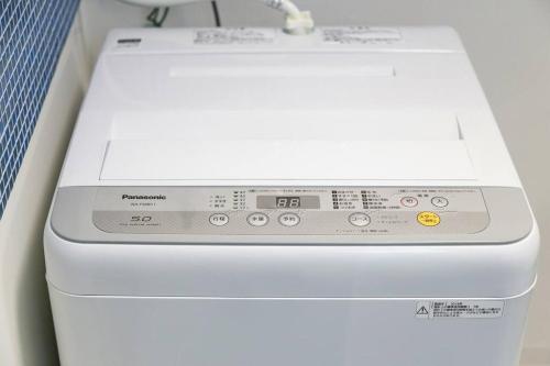 a white printer sitting on top of a table at MS STUDIO in Asahikawa
