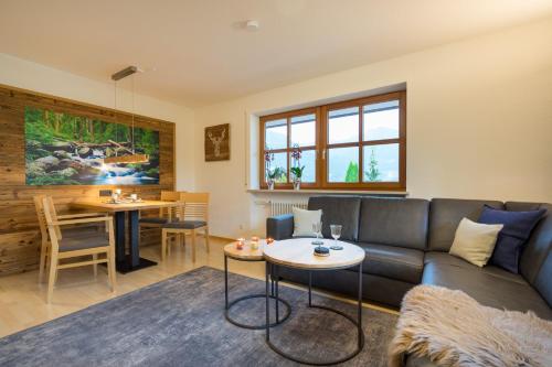 Posezení v ubytování Ferienwohnung Alpentraum-Panorama Chalet