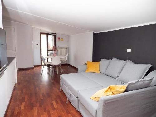 a living room with a bed and a table at Minià in Pescara