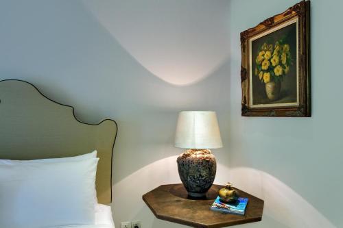 Ένα ή περισσότερα κρεβάτια σε δωμάτιο στο Room & Vespa 3 - Relaxing Stay Center Seminyak