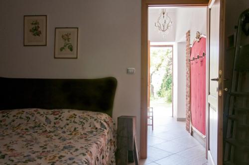 Кровать или кровати в номере Agriturismo Villa Cheti