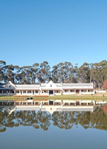 a view of the building from across the water at Morgansvlei Country Estate in Tulbagh