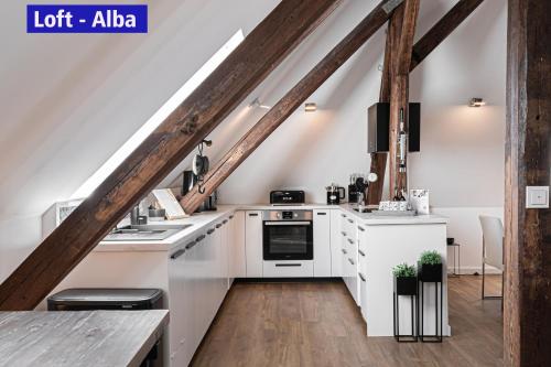 A cozinha ou cozinha compacta de Design-Loft und Apartment im Villenviertel