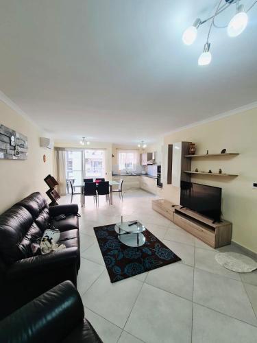 Zona d'estar a Mela Apartment 1