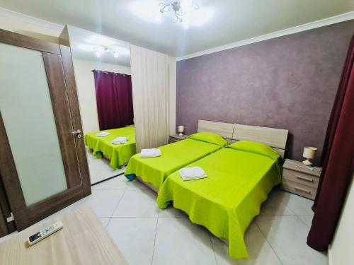 Кровать или кровати в номере Mela Apartment 1
