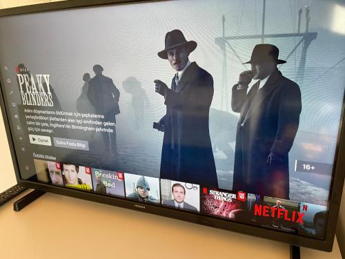 TV a/nebo společenská místnost v ubytování Cozy Home in Ardino