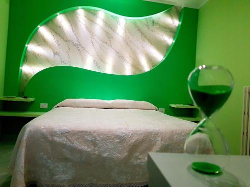 Un pat sau paturi într-o cameră la Nido nel Borgo