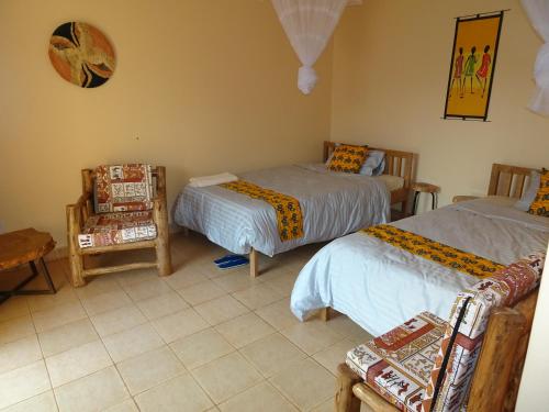 Postel nebo postele na pokoji v ubytování Lycklama Guesthouse