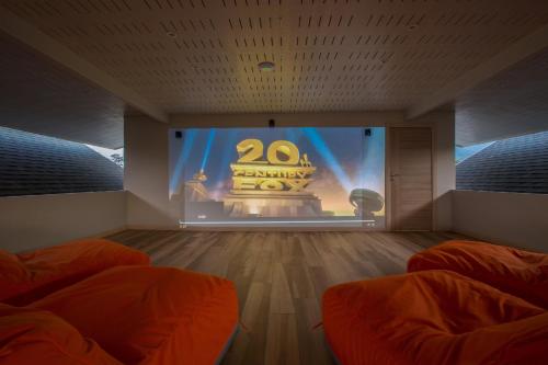 a room with a anniversary show on a stage at Sea&Sky Beach Resort in Mae Nam
