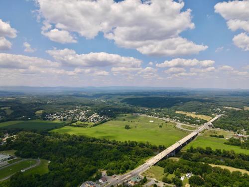 an aerial view of a road in a green field at Twi-Lite Inn in Front Royal