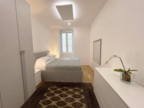 Trieste 411 - Rooms & Apartmentsにあるベッド