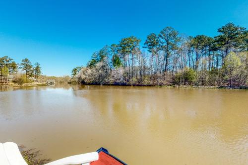 a view of a river with a boat in it at The Wonder of Woodslake in Eatonton