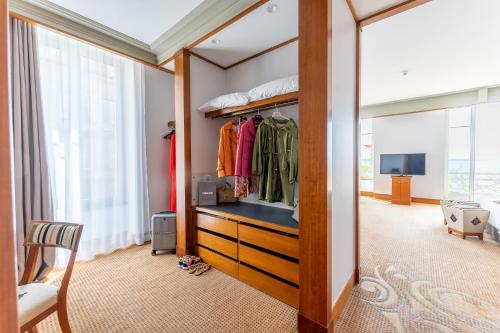 a room with a closet with a dresser at Beau Rivage Hotel in Neuchâtel