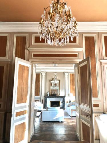 Ένα ή περισσότερα κρεβάτια σε δωμάτιο στο L'Hotel de Hercé Chambre d'Hote