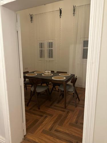 a dining room with a table and chairs at Dar Sayang in Taif