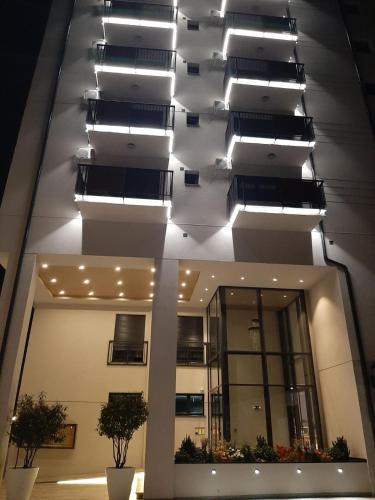 a building with a bunch of lights on the ceiling at Apartman Luxor in Jagodina