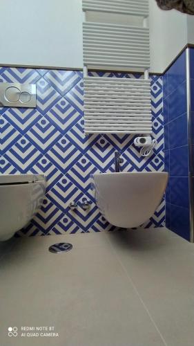Un baño de Cafè Latino Suites