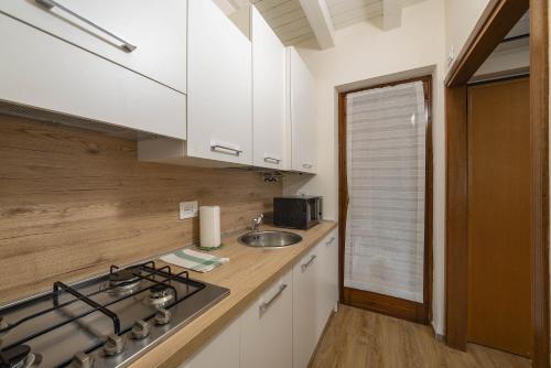 Cuisine ou kitchenette dans l'établissement Dimore Verona