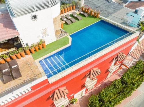 Bazén v ubytování GHL Collection Armería Real Hotel nebo v jeho okolí