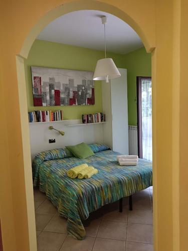 Ένα ή περισσότερα κρεβάτια σε δωμάτιο στο Villa Almelia