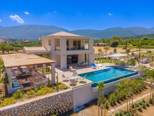 an aerial view of a villa with a swimming pool at Claire villa in Sami