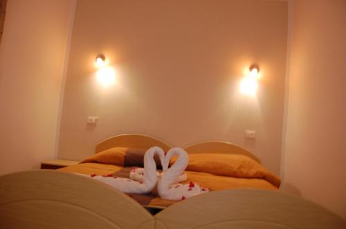 Ein Bett oder Betten in einem Zimmer der Unterkunft Résidence Chahd de Charme