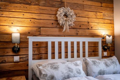 Posteľ alebo postele v izbe v ubytovaní Apartamenty sudeckie nad zalewem III
