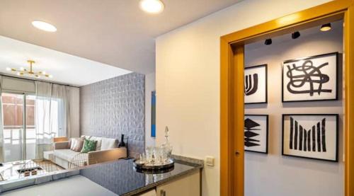 a room with a kitchen and a living room at HOSTAL BEDMATES in Barcelona