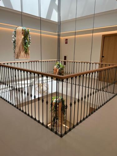 a staircase in a building with plants on it at Alux Boutique Hotel in Málaga