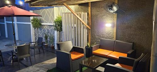 Area soggiorno di The Leneade - City Centre at Wuse 2