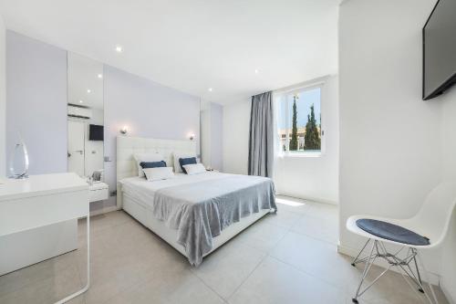 En eller flere senge i et værelse på Coração do Mar by OCvillas