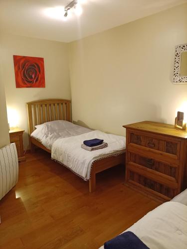 Letto o letti in una camera di La Tentonniere