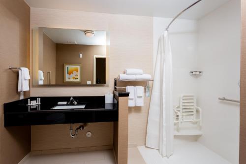 a bathroom with a sink and a shower at Fairfield Inn & Suites by Marriott Bay City, Texas in Bay City