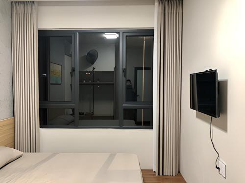Μια τηλεόραση ή/και κέντρο ψυχαγωγίας στο Tít Mít HomeStay